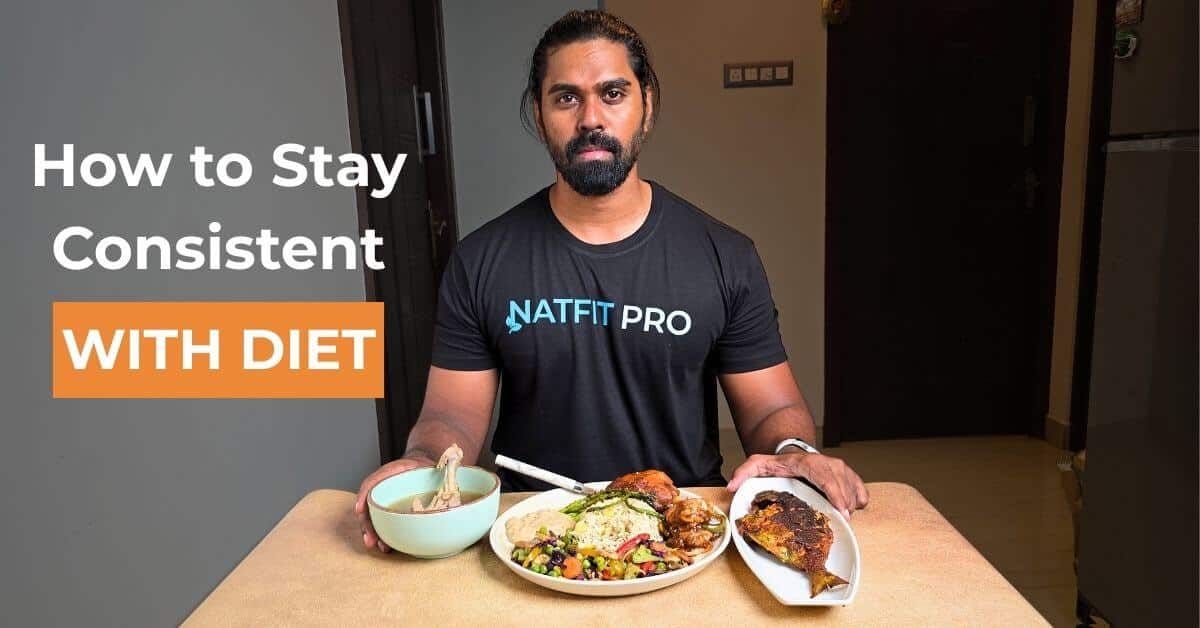 Tamil from Natfit Pro sitting at a table with healthy meals including chicken, fish, and rice, illustrating diet consistency.